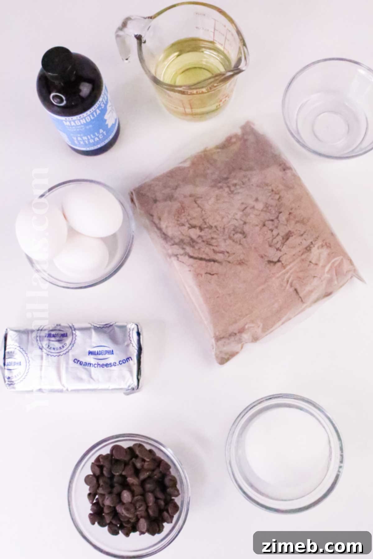 Ingredients for Cheesecake Chocolate Brownies: Boxed brownie mix, chocolate chips, cream cheese, sugar, egg, vanilla extract.