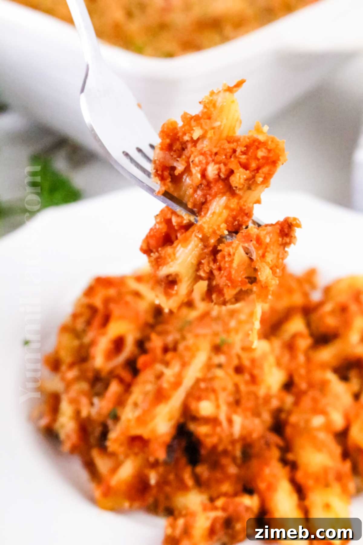Chicken Parmesan Casserole recipe card image.