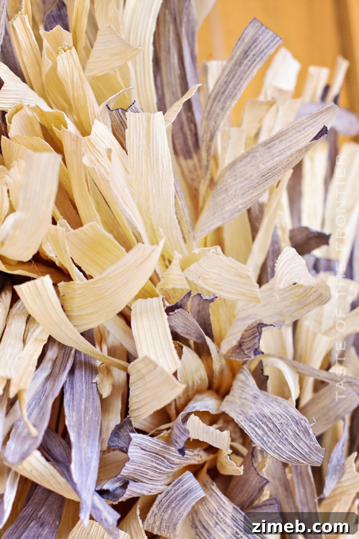 Close up of blue and yellow corn husks prepared for crafting a fall wreath