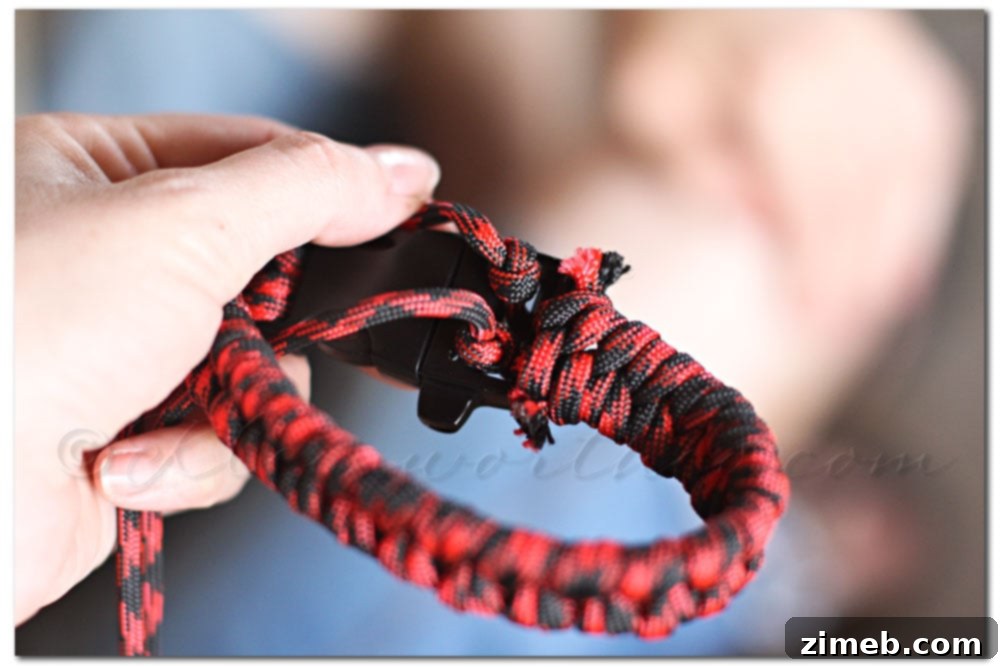 Handmade Fishtail Paracord Dog Collar 19 Knotting paracord strands to secure the second buckle