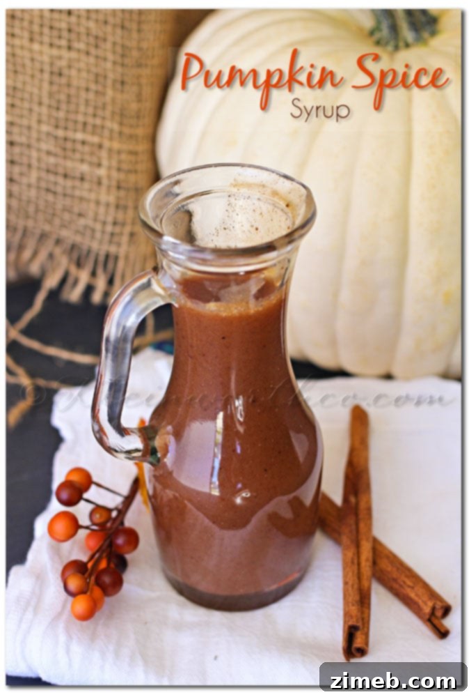 Homemade Pumpkin Spice Syrup drizzled over pancakes