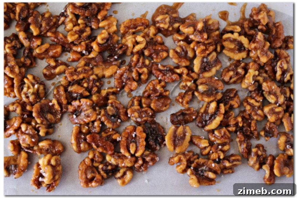 Delicious Pumpkin Spice Candied Walnuts on a baking sheet