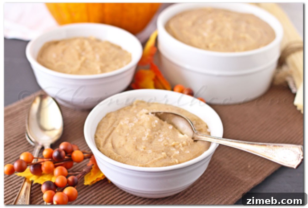 Decadent Salted Caramel Pumpkin Spice Pudding 2 Rich and creamy Salted Caramel Pumpkin Spice Pudding in elegant glass serving dishes, garnished with a sprinkle of sea salt.