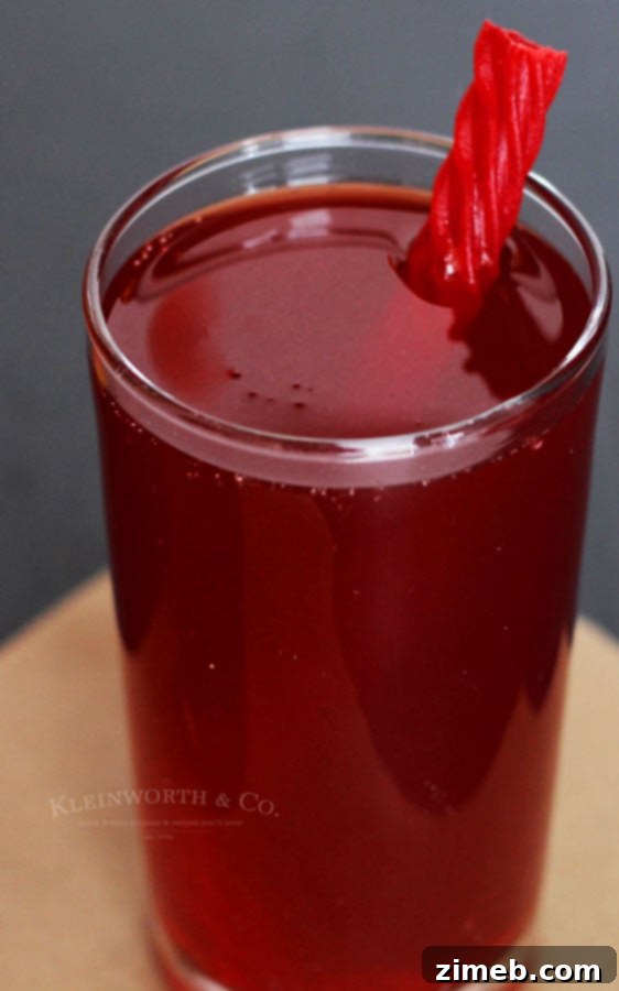 Crimson Fang Punch 6 Halloween Vampire Punch Drink served in a festive glass.
