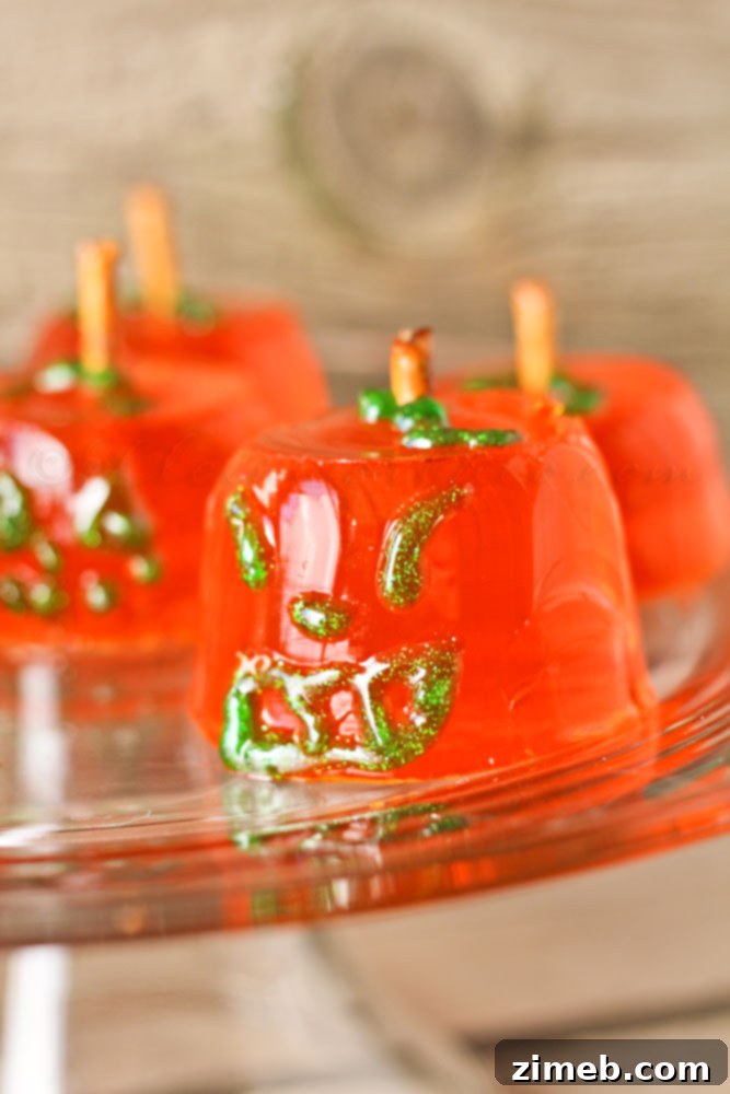 Halloween Jell-O Pumpkin Jigglers: Spooky Party Bites 6 Kids helping to make Jell-O JIGGLERS Pumpkins