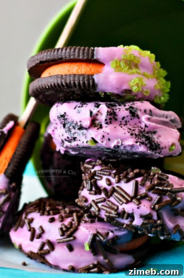 Monster Oreo Pops 8 Decorated Halloween Oreo Cookies on a white background, showcasing festive designs