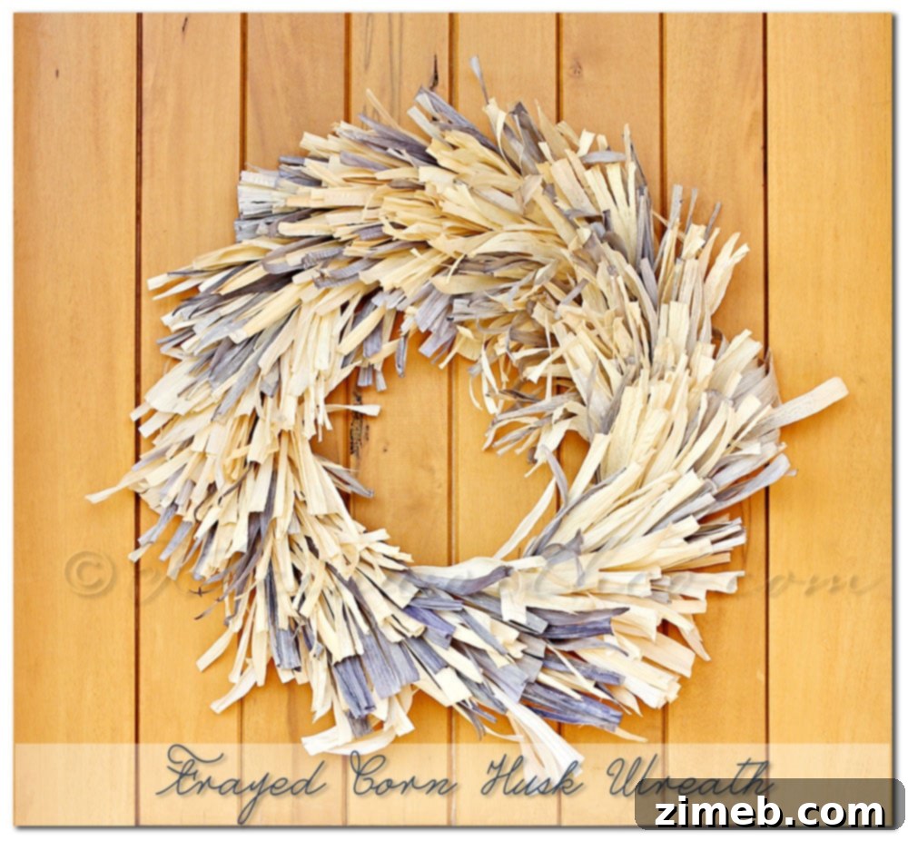 Elegant Frayed Corn Husk Wreath, a chic and textured DIY fall decoration.