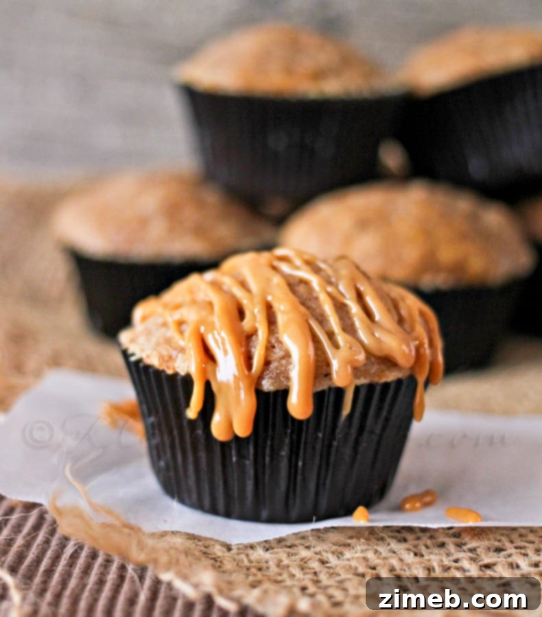 Dulce de Leche Pumpkin Muffins with creamy caramel drizzle