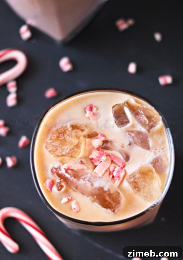 Blush Peppermint Russian 3 Close-up of a Pink Peppermint Russian cocktail in a glass, ready for a holiday celebration