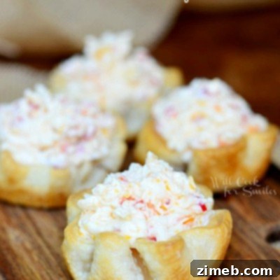 Sweet Pepper Garlic Cheese Cups - an easy, cheesy appetizer recipe from Will Cook For Smiles, shared on Kleinworth & Co. Perfect for New Year's Eve parties and family gatherings.