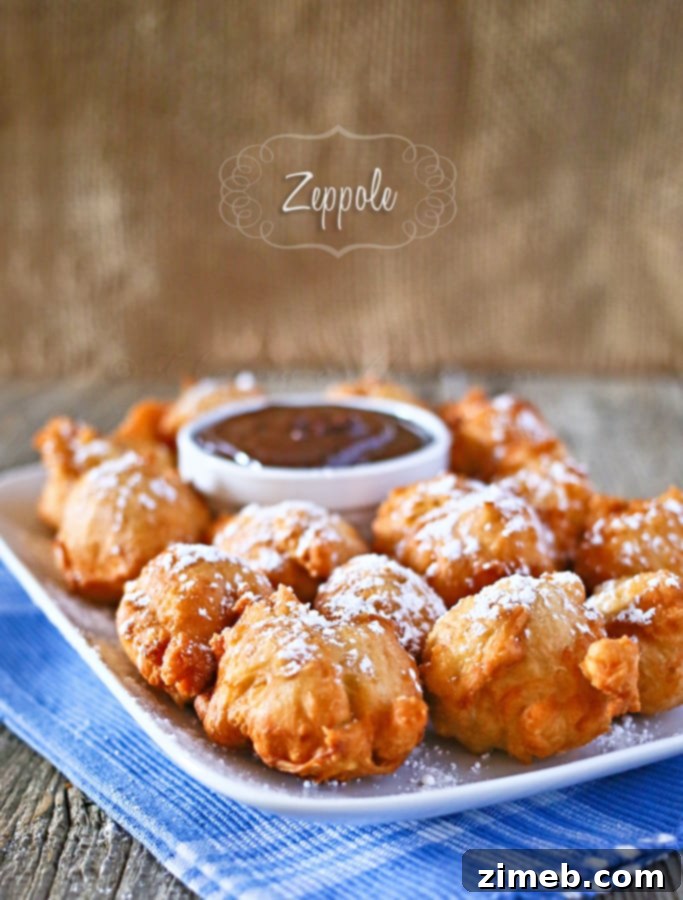 Zeppole: Italian Fried Delights 4 Zeppole served with Mocha Dulce de Leche dipping sauce in a small bowl