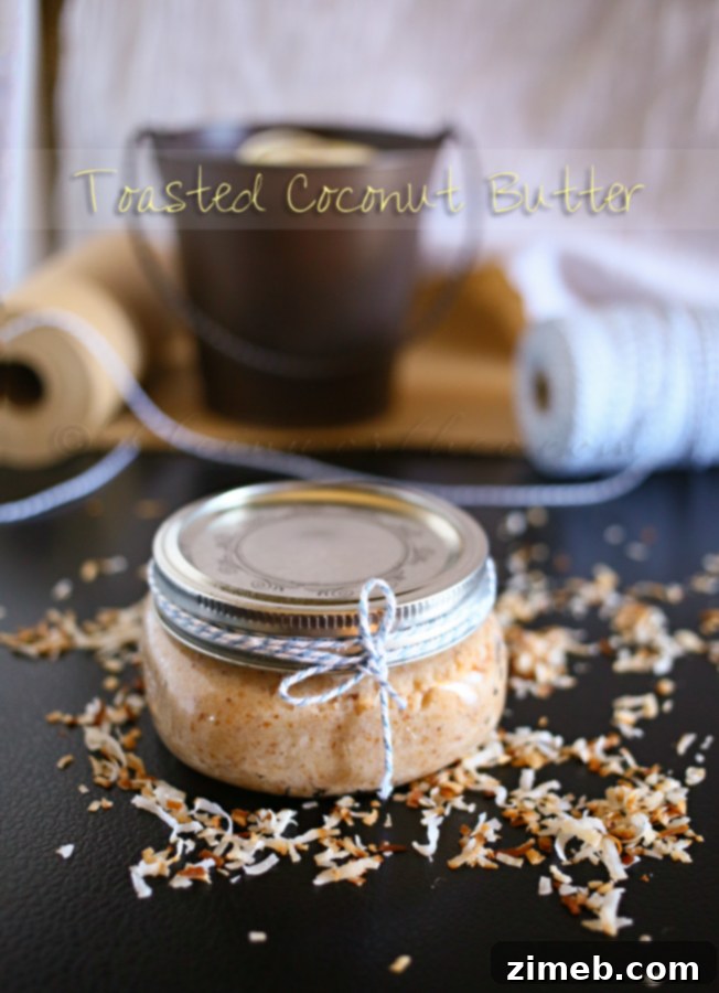 Golden Roasted Coconut Spread 3 Close-up of freshly made Toasted Coconut Butter in a glass jar
