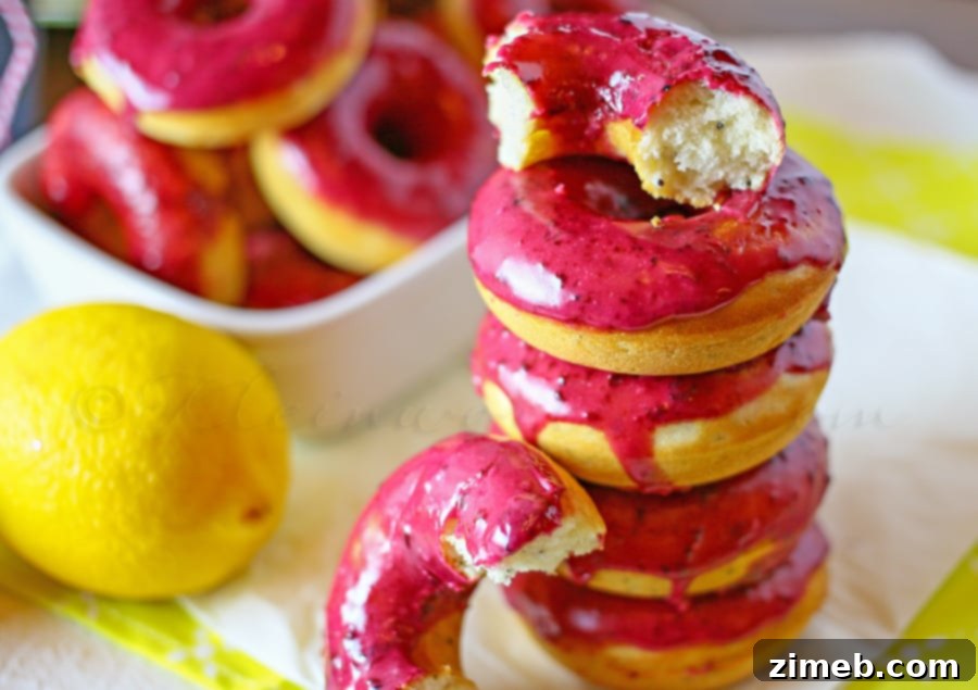 Lemon Poppy Seed Donuts topped with Lemon Blueberry Glaze 5 Lemon Poppy Seed Donuts with Lemon Blueberry Glaze
