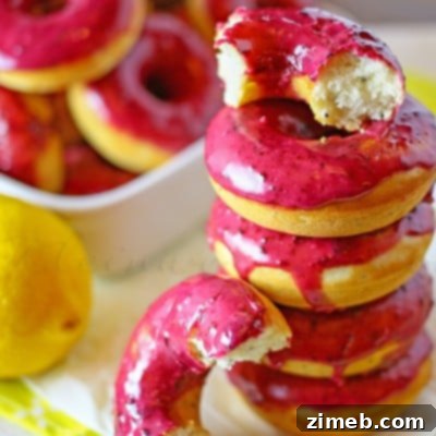 Lemon Poppy Seed Donuts topped with Lemon Blueberry Glaze 7 Lemon Poppy Seed Donuts with Lemon Blueberry Glaze