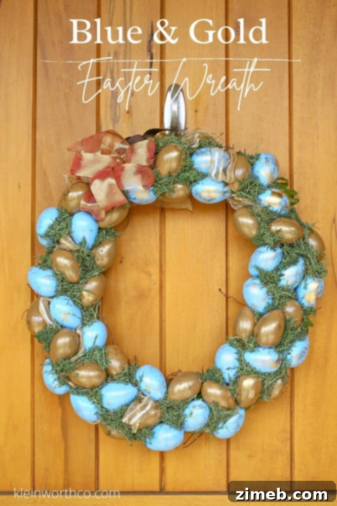 Elegant Blue and Gold Easter Wreath 2 A stunning blue and gold Easter wreath for your front door, featuring painted faux eggs and moss. Perfect DIY spring decor.