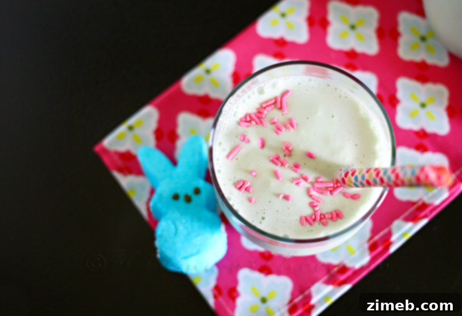 Peep Milkshake in a glass with whipped cream and sprinkles