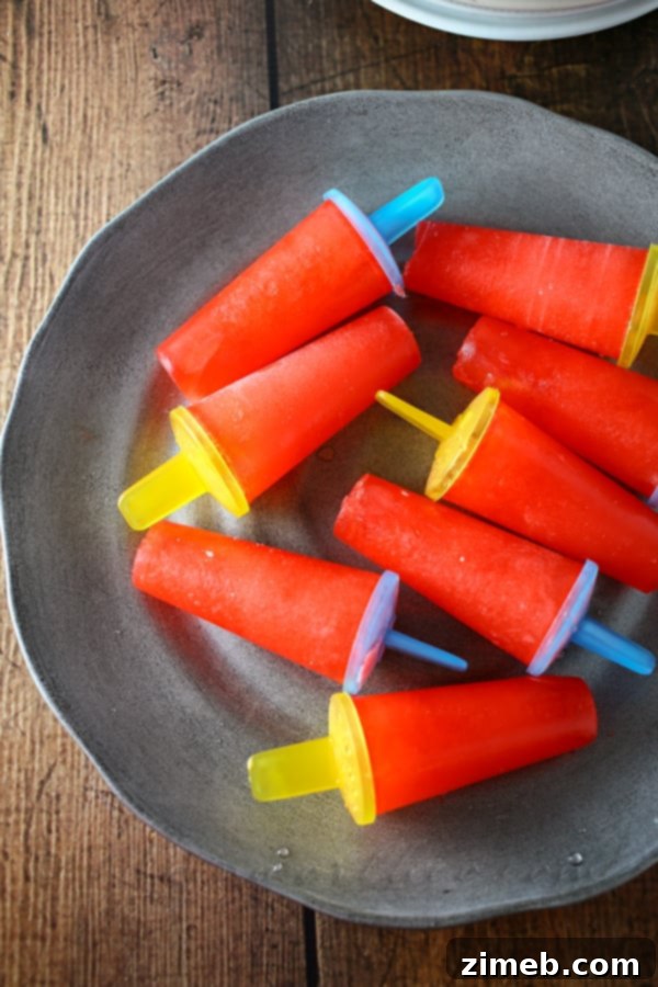 Quick & Cool Ice Pops 6 Popsicle sticks inserted into full molds, ready for the freezer.