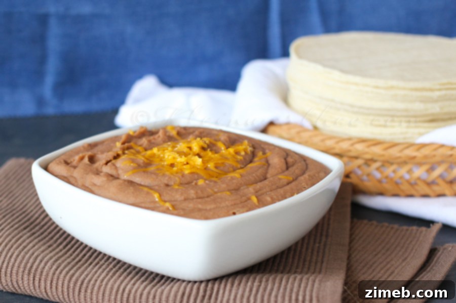 Authentic Restaurant Refried Beans 2 Restaurant Style Refried Beans, a creamy and flavorful side dish from Kleinworth & Co.