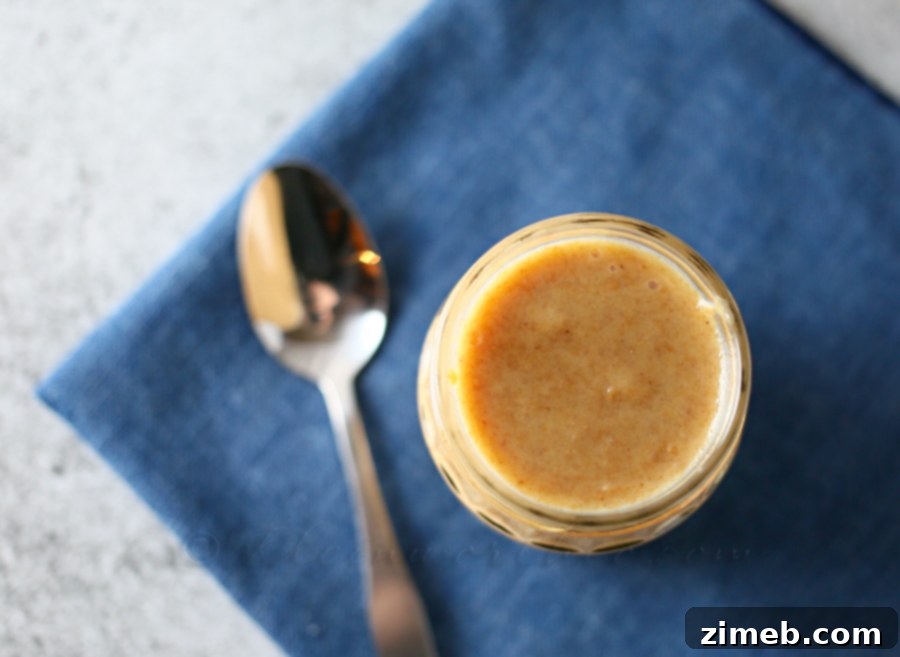 Creamy Peanut Butter Sauce 2 Homemade Peanut Butter Sauce Drizzled on Ice Cream