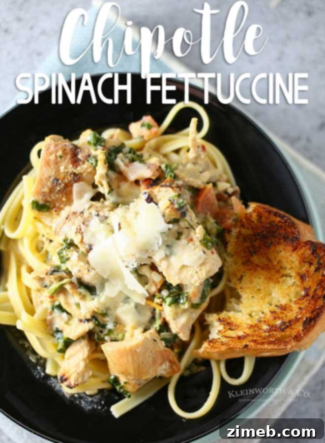 Close-up of Chipotle Spinach Fettuccine with creamy sauce and chicken