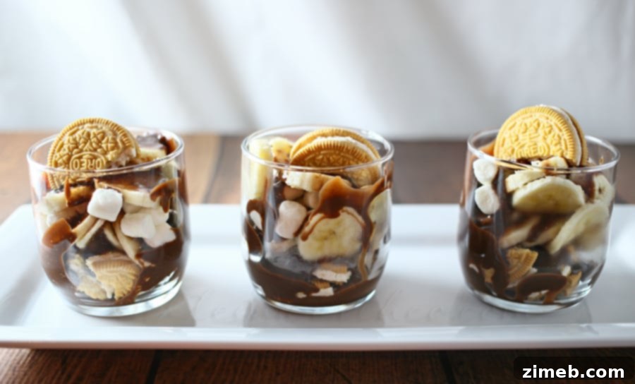 Golden Banana Cloud Fudge Parfait 4 Several Banana Marshmallow Fudge Parfaits displayed on a table
