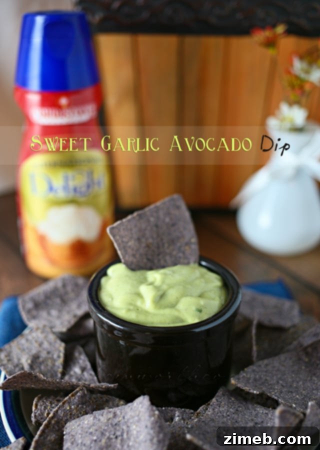 Creamy Sweet Garlic Avocado Dip 5 Sweet Garlic Avocado Dip presented in a rustic, inviting bowl, perfect for sharing. www.kleinworthco.com