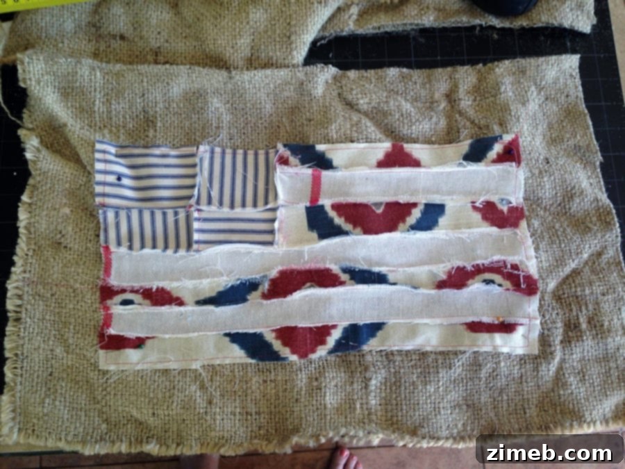 Cozy Patchwork Flag Pillow 5 Scrappy flag panel pinned onto burlap pillow front