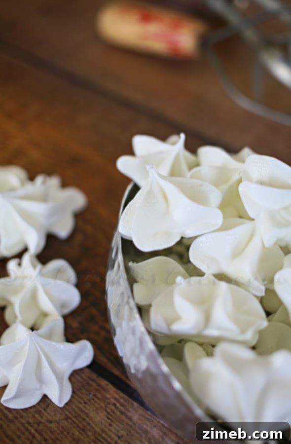 Cake Batter Kisses 2 Cake Batter Meringues - Deliciously light and airy cookies with a hint of cake batter flavor.