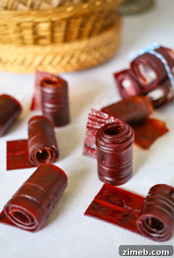 Sun-Kissed Plum Leather 4 Smooth plum puree mixed with sugar in a bowl, ready to be spread onto parchment paper.