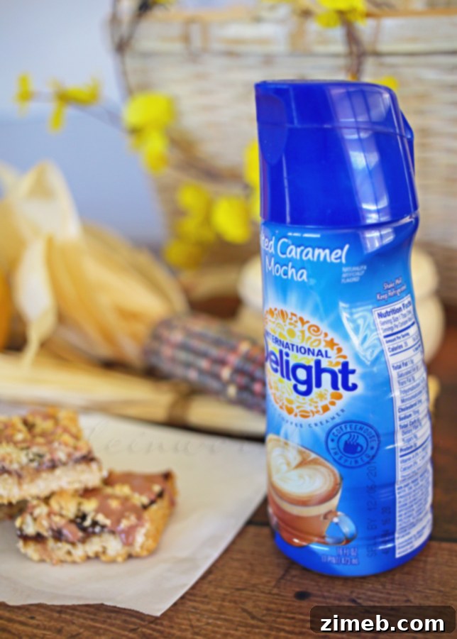 Close-up of the elegant Salted Caramel Mocha Glaze artfully drizzled over freshly baked Fig Crumble Bars.