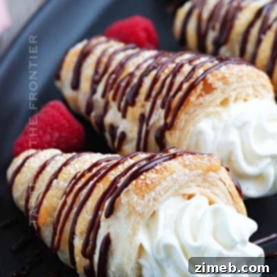 Autumn Spiced Pumpkin Caramel Biscotti 9 Cream Horns, a sweet pastry dessert.