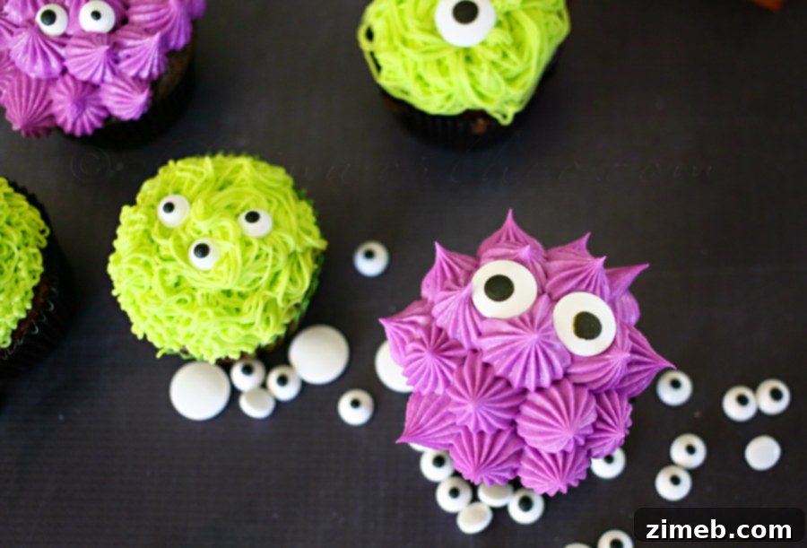 Beastly Bites 7 Monster Cupcakes decorated with candy eyes and vibrant frosting