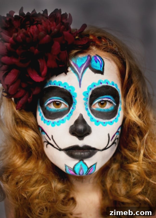 Adding vibrant turquoise and purple colors to Day of the Dead face paint