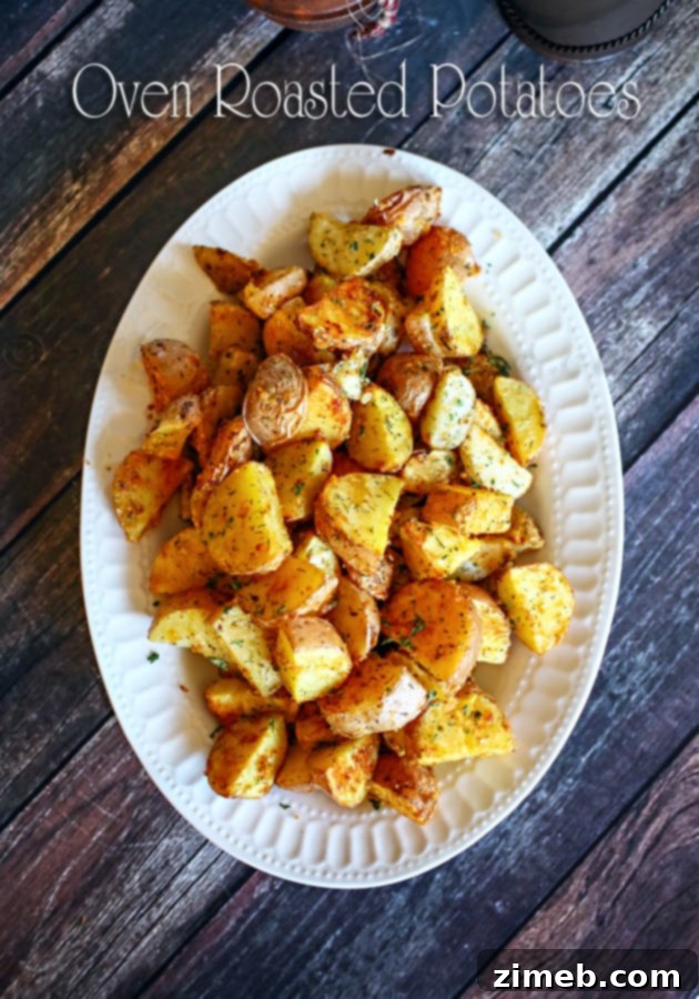 Delicious oven roasted potatoes served in a rustic bowl, garnished with fresh herbs