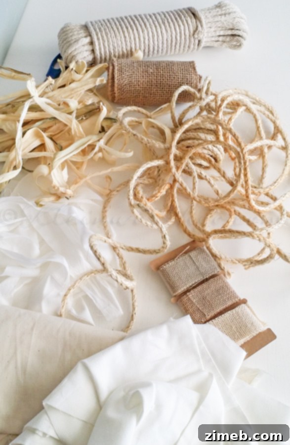 Wildcrafted Wonders 3 A collection of crafting supplies for natural ornaments, including a hot glue gun, various types of ropes, corn husks, and burlap