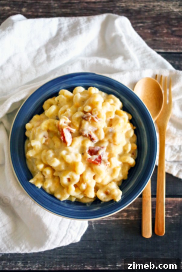 Bacon Mac & Cheese, a hearty and creamy pasta dish with crispy bacon pieces
