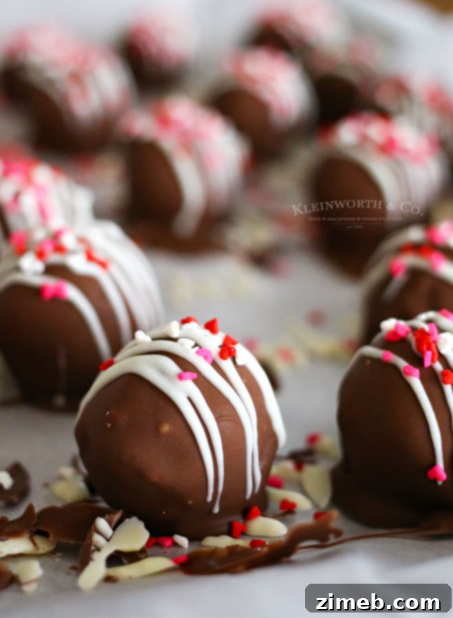Sweetheart Oreo Truffle Kisses 3 Recipe for Valentine Oreo Truffles with white chocolate drizzle