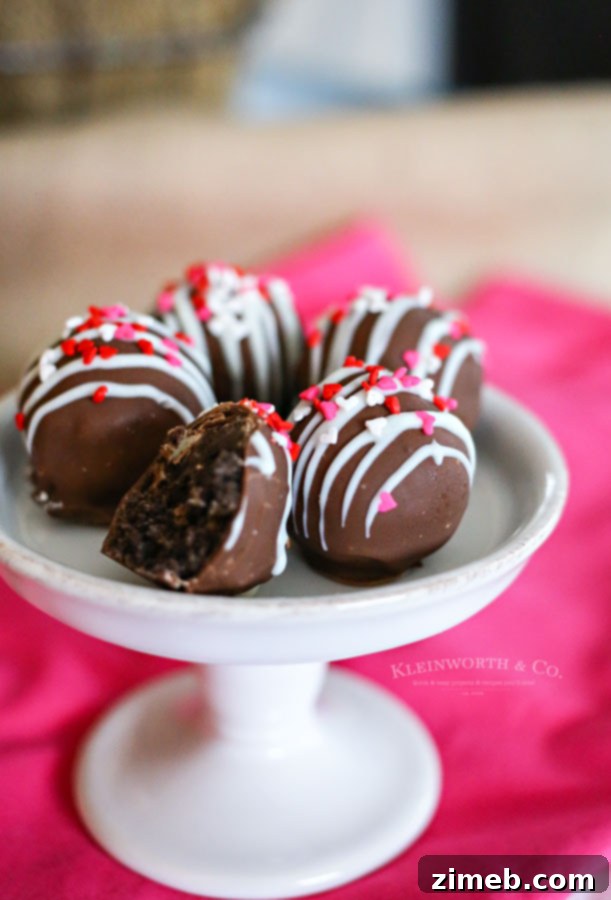 Sweetheart Oreo Truffle Kisses 5 Delicious chocolate Valentine Oreo Truffles arranged on a platter