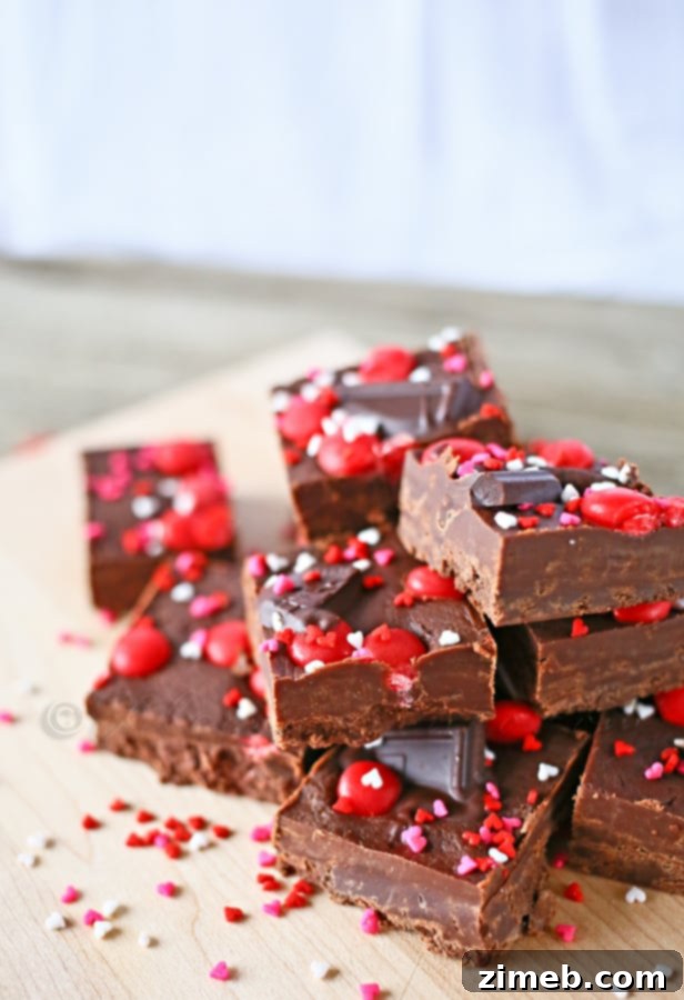 Red Hot Dark Chocolate Fudge Decadent Red Hot Dark Chocolate Fudge, a spicy and sweet treat with a rich chocolate base and a kick of cinnamon.