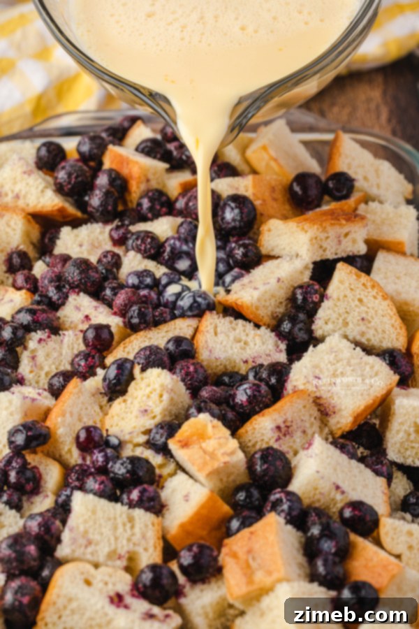 Blueberry French Toast Bake 9 pouring the egg mixture