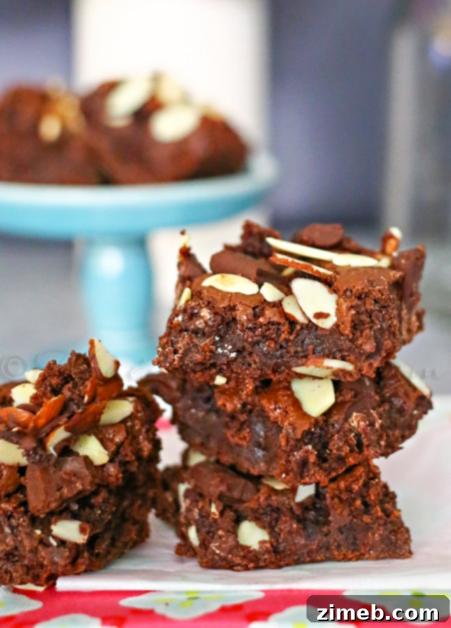Close-up of Chocolate Almond Cake Mix Bars, showcasing the texture and toppings.