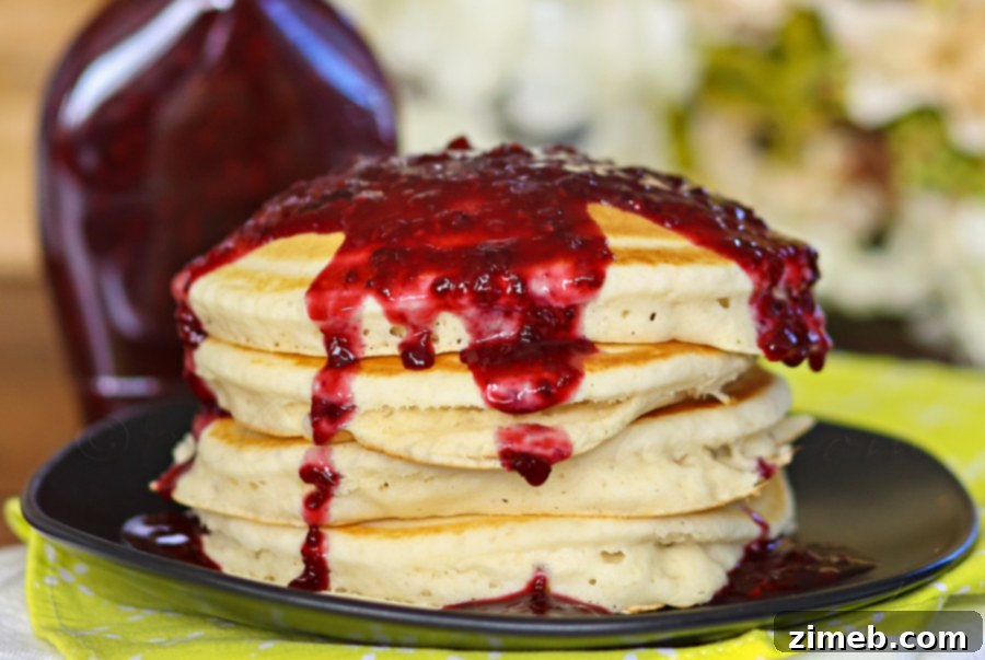 Homemade Blackberry Syrup in a glass bottle