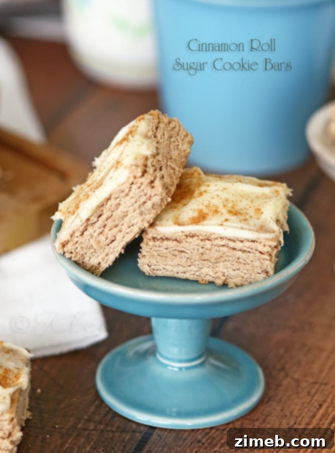 Cinnamon Roll Sugar Cookie Bars - topped with cinnamon sugar