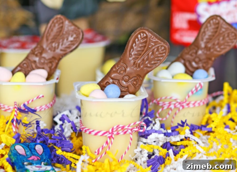 Hoppy Easter Pudding Cups 6 Decorating Easter Pudding Cups with chocolate bunnies and Easter egg candies.