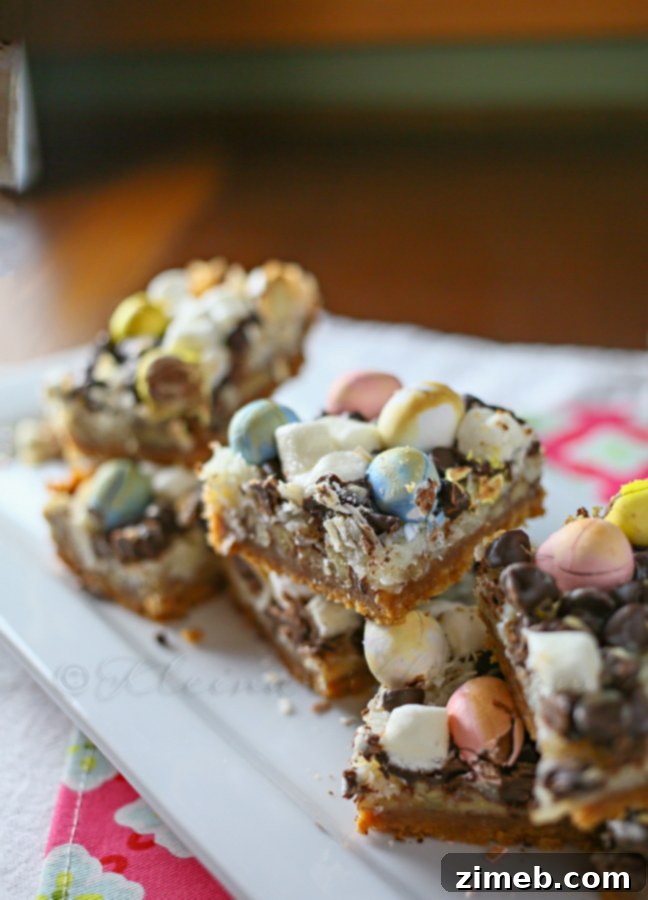 Festive Cadbury Magic Bars, a twist on the classic seven layer bar with Cadbury eggs
