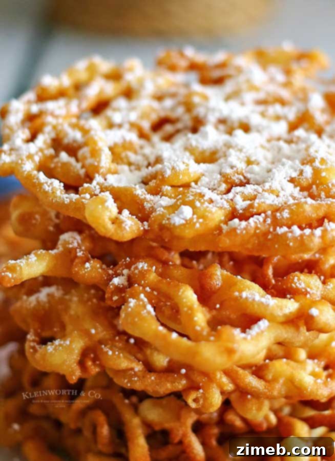 Ingredients laid out for how to make Funnel Cake from scratch, emphasizing fresh ingredients.
