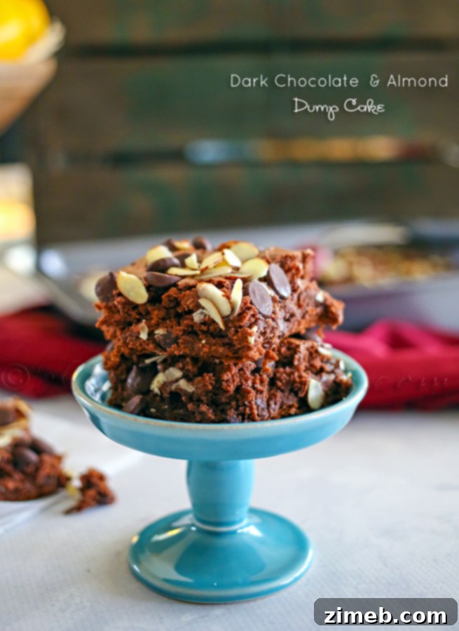 Effortless Dark Chocolate Almond Dream 3 Dark Chocolate & Almond Dump Cake, a close-up showing the rich texture and delicious toppings of chocolate chips and almonds.
