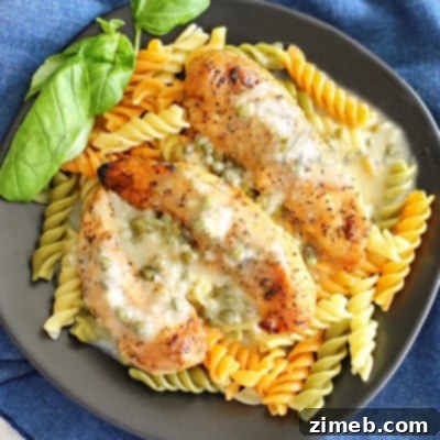 Grilled Chicken Piccata with tri-color fussilli pasta for an easy family dinner.