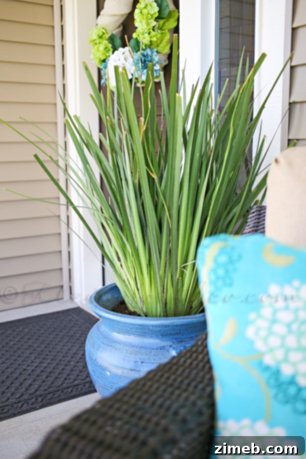 Summer Porch Makeover - Elegant setup with cohesive color scheme and natural textures.