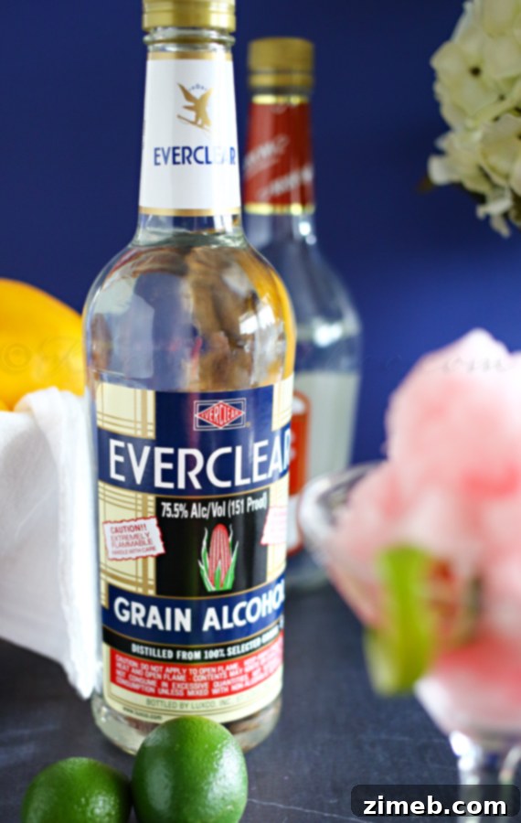 Ingredients for a Twisted Frozen Cosmo including Everclear and cranberry liquor